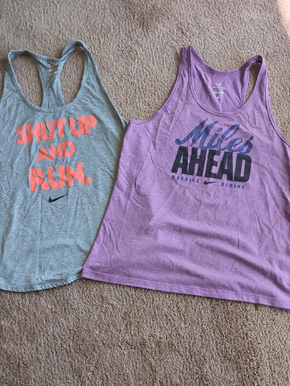 Two Nike Dri-FIT Women's Large Running Tank Tops